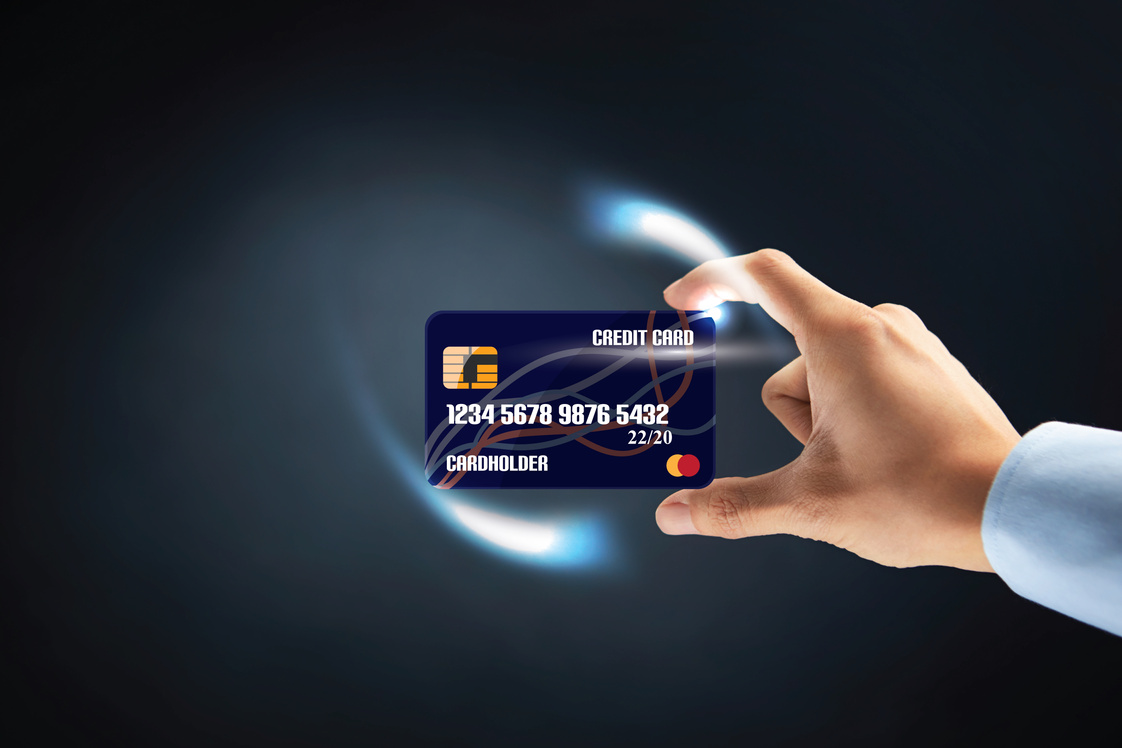 Hand holding credit card concept